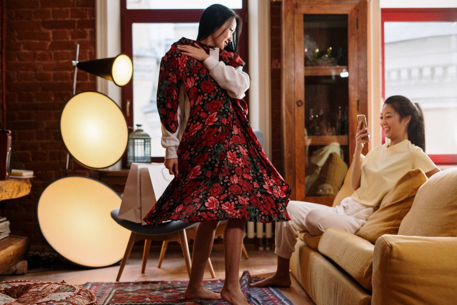at home date ideaswoman showing off clothes to partner source: cottonbro from Pexels